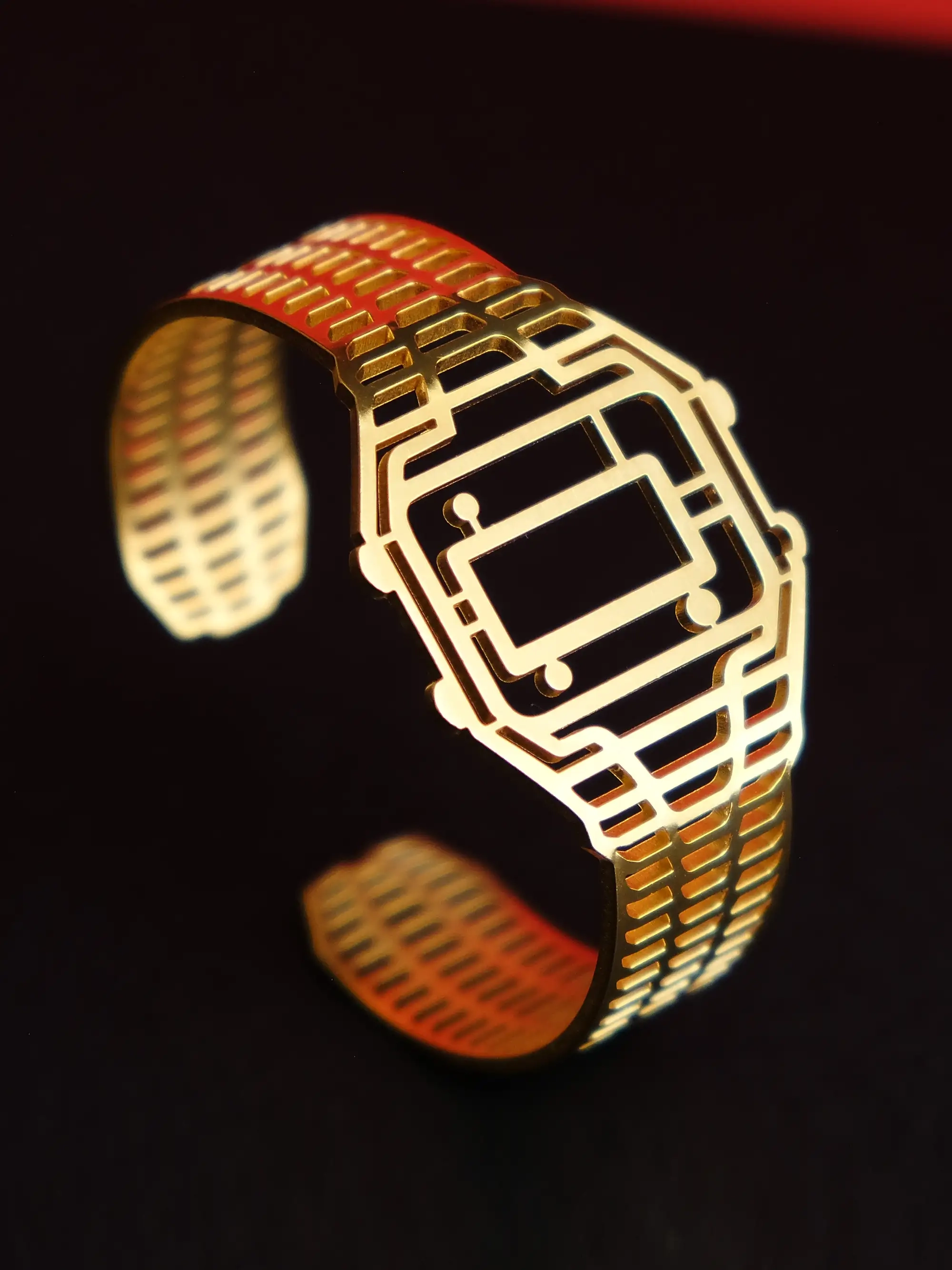 TIMEPEACE minimalist golden bracelet, watch-inspired timepiece jewelry viewed from side on black background