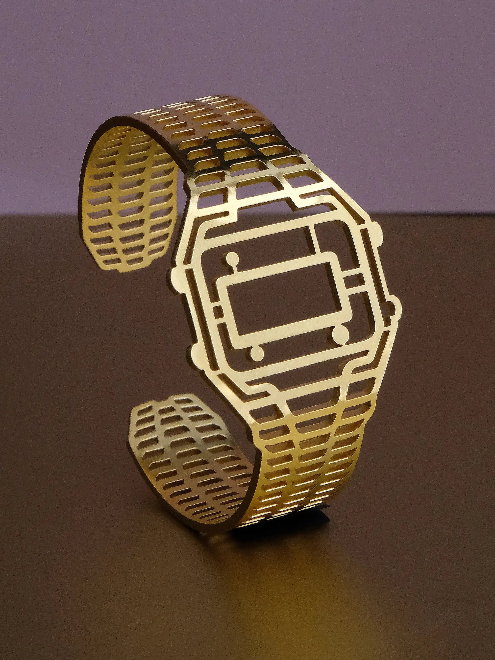 TIMEPEACE golden bracelet, minimalist vintage Casio watch-inspired timepiece jewelry from front on violet golden background