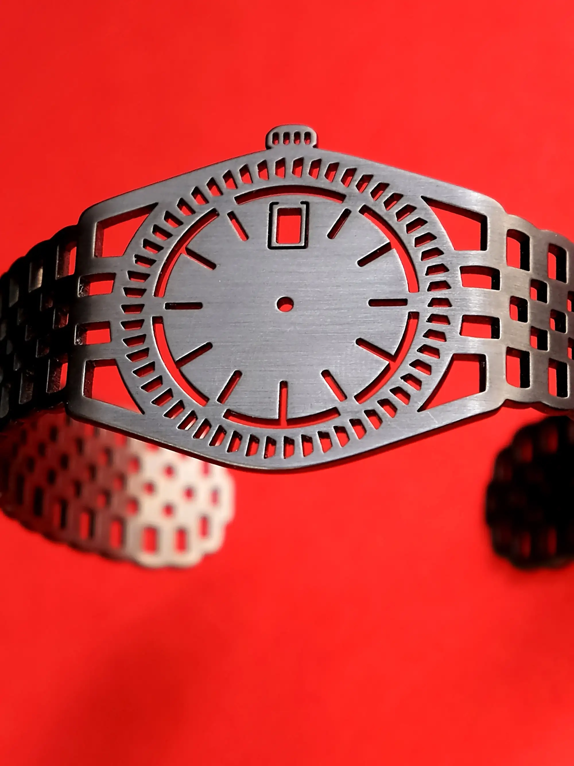 The dark grey timepiece bracelet with smooth minimalist design is Ruthenium plated in high quality