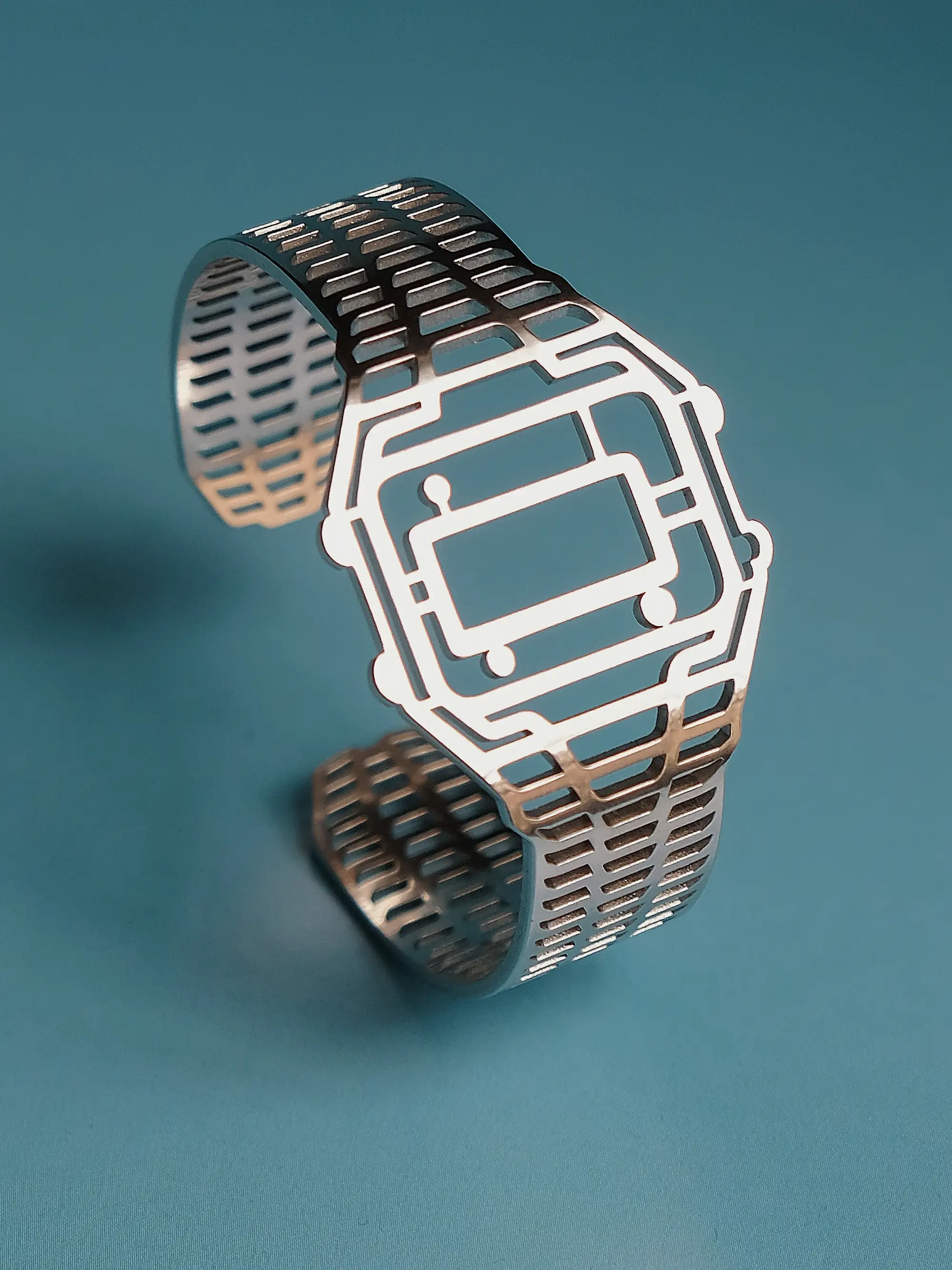 Front-facing silver-plated TIMEPEACE bracelet, minimalist watch-style jewelry with polished metal finish against a blue background