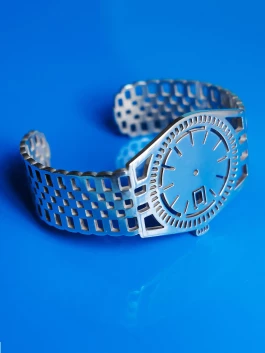 TIMEPEACE sterling silver bracelet, minimalist design, watch-inspired timepiece jewelry from side against blue background 
