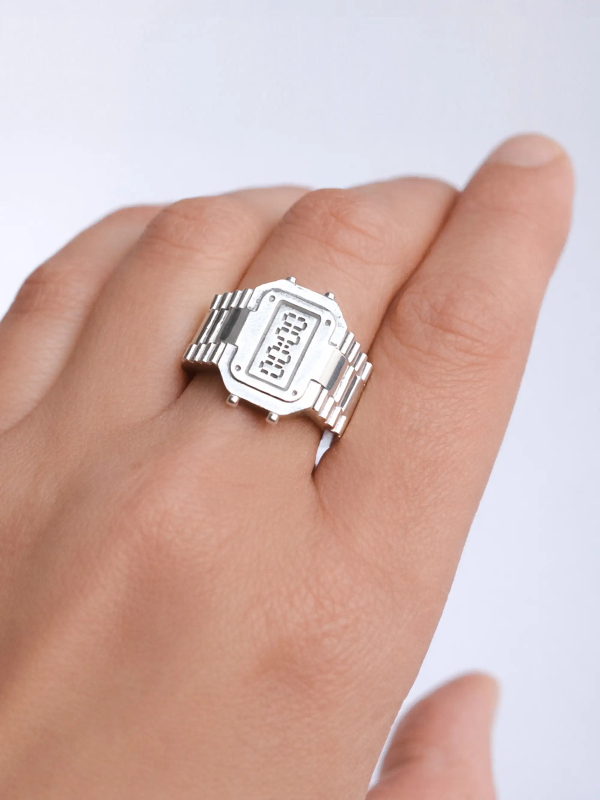 TIMEPEACE ringwatch on finger, casio-style watch-inspired ring made from recycled 925 sterling silver in Germany