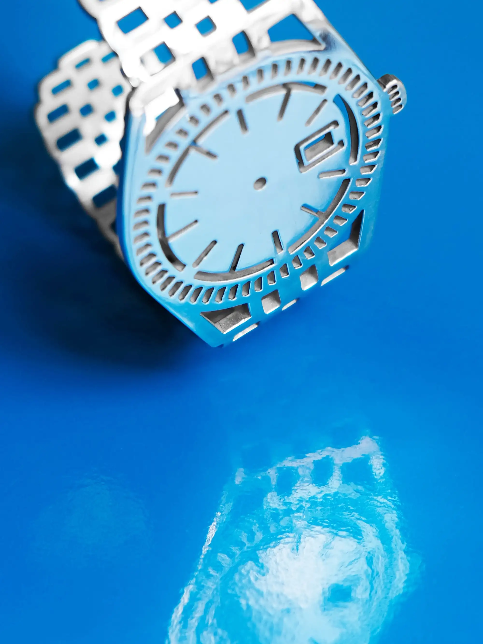 Detail view of sterling silver TIMEPEACE bracelet, watch-inspired jewelry with cut-out links